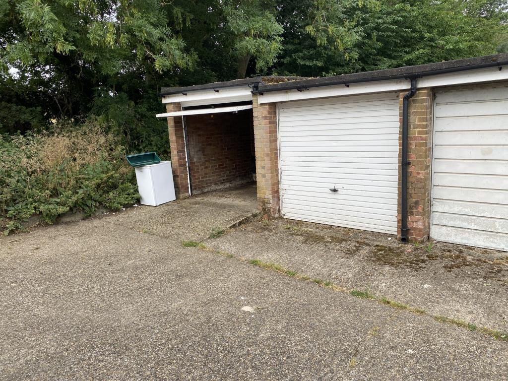 Lot: 113 - TWO-BEDROOM MAISONETTE FOR REDECORATION WITH GARAGE EN-BLOC - Garage